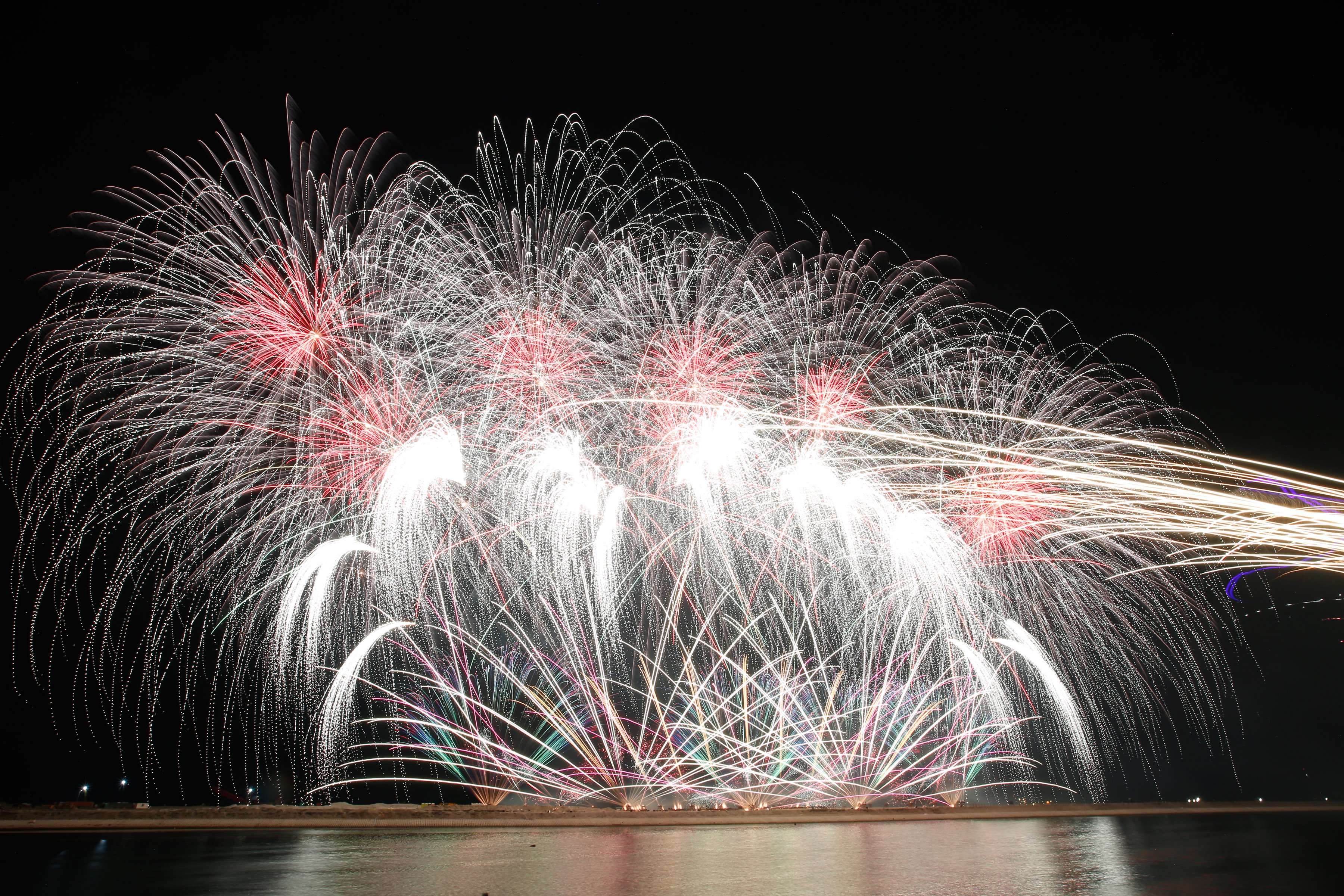 Philippines' Platinum Fireworks Incorporated lights up the Manila Bay skies during the finale exhibition of the 13th Philippine International Pyromusical Competition at the SM Mall of Asia in Pasay City on 11 April 2026. Pyrotex Fireworx from the United Kingdom took this year's championship title, besting seven other competing countries.