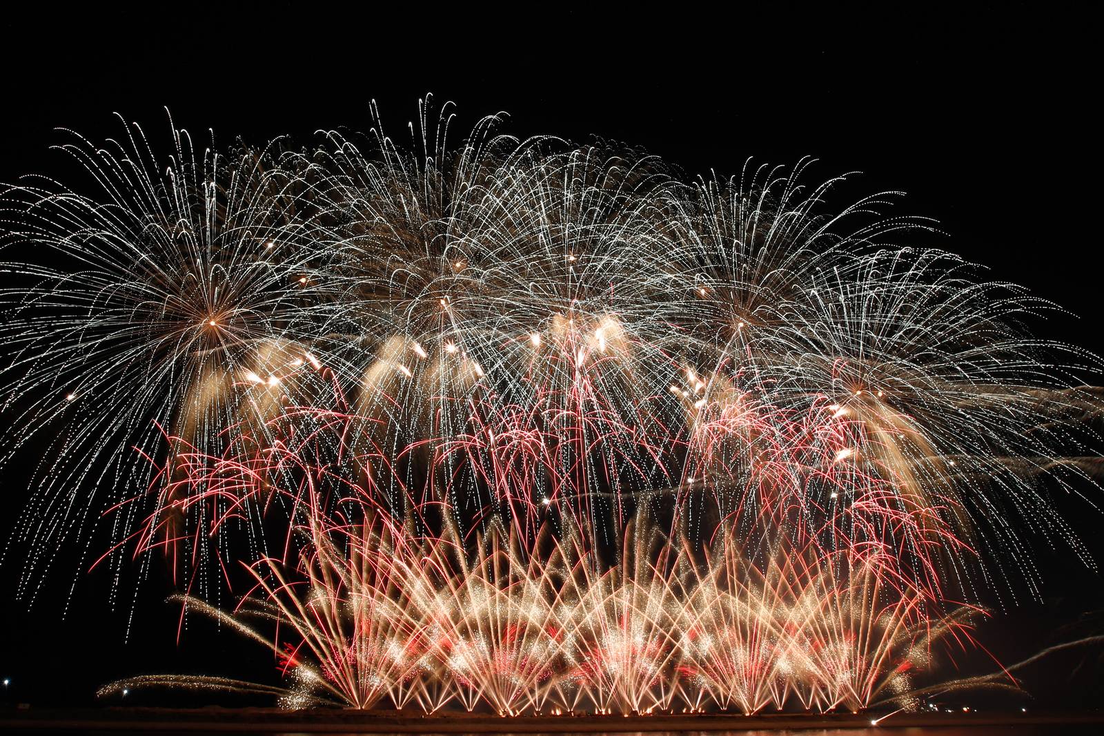 Philippines' Platinum Fireworks Incorporated lights up the Manila Bay skies during the finale exhibition of the 13th Philippine International Pyromusical Competition at the SM Mall of Asia in Pasay City on 11 April 2026. Pyrotex Fireworx from the United Kingdom took this year's championship title, besting seven other competing countries.