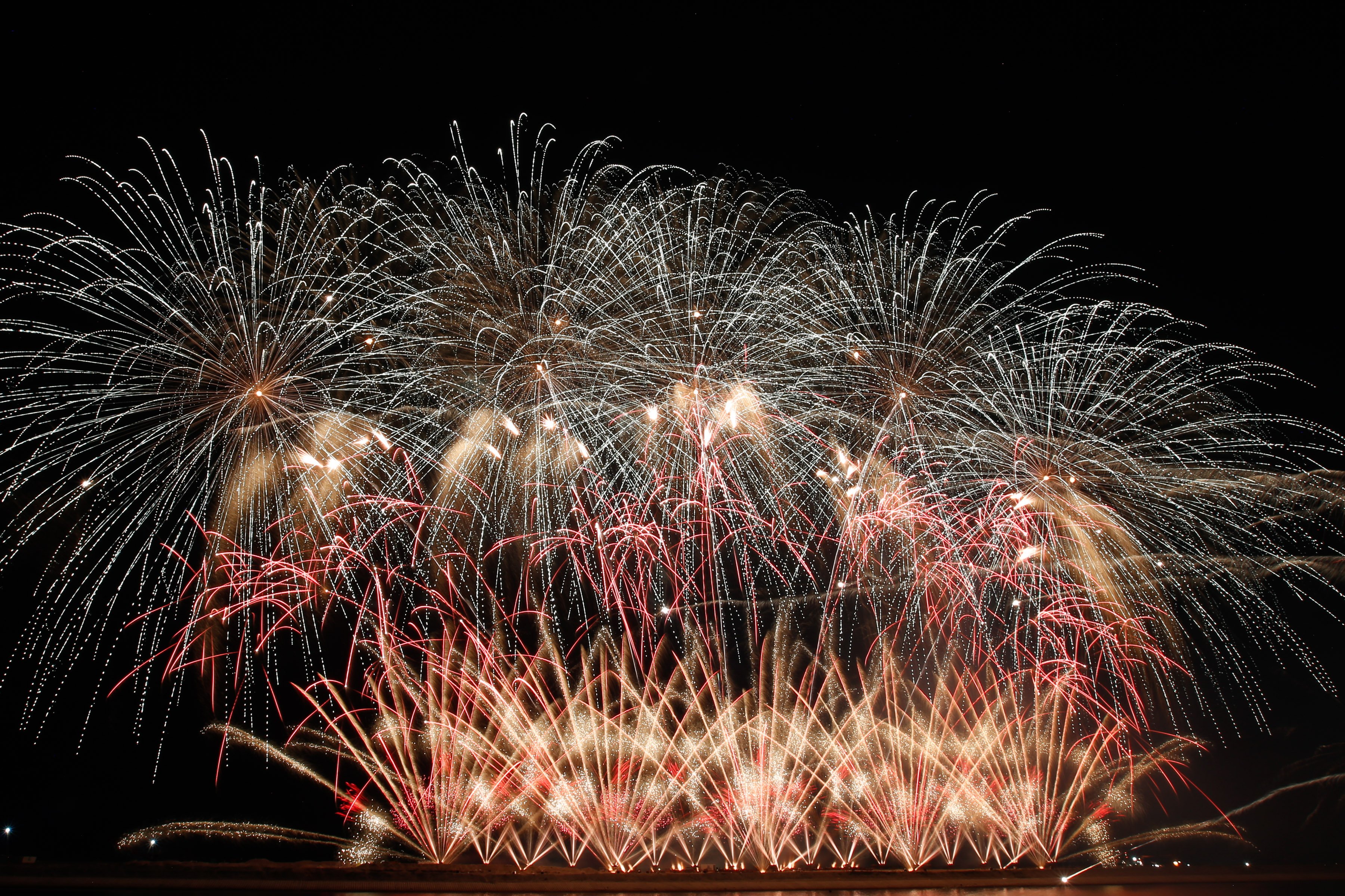 Philippines' Platinum Fireworks Incorporated lights up the Manila Bay skies during the finale exhibition of the 13th Philippine International Pyromusical Competition at the SM Mall of Asia in Pasay City on 11 April 2026. Pyrotex Fireworx from the United Kingdom took this year's championship title, besting seven other competing countries.