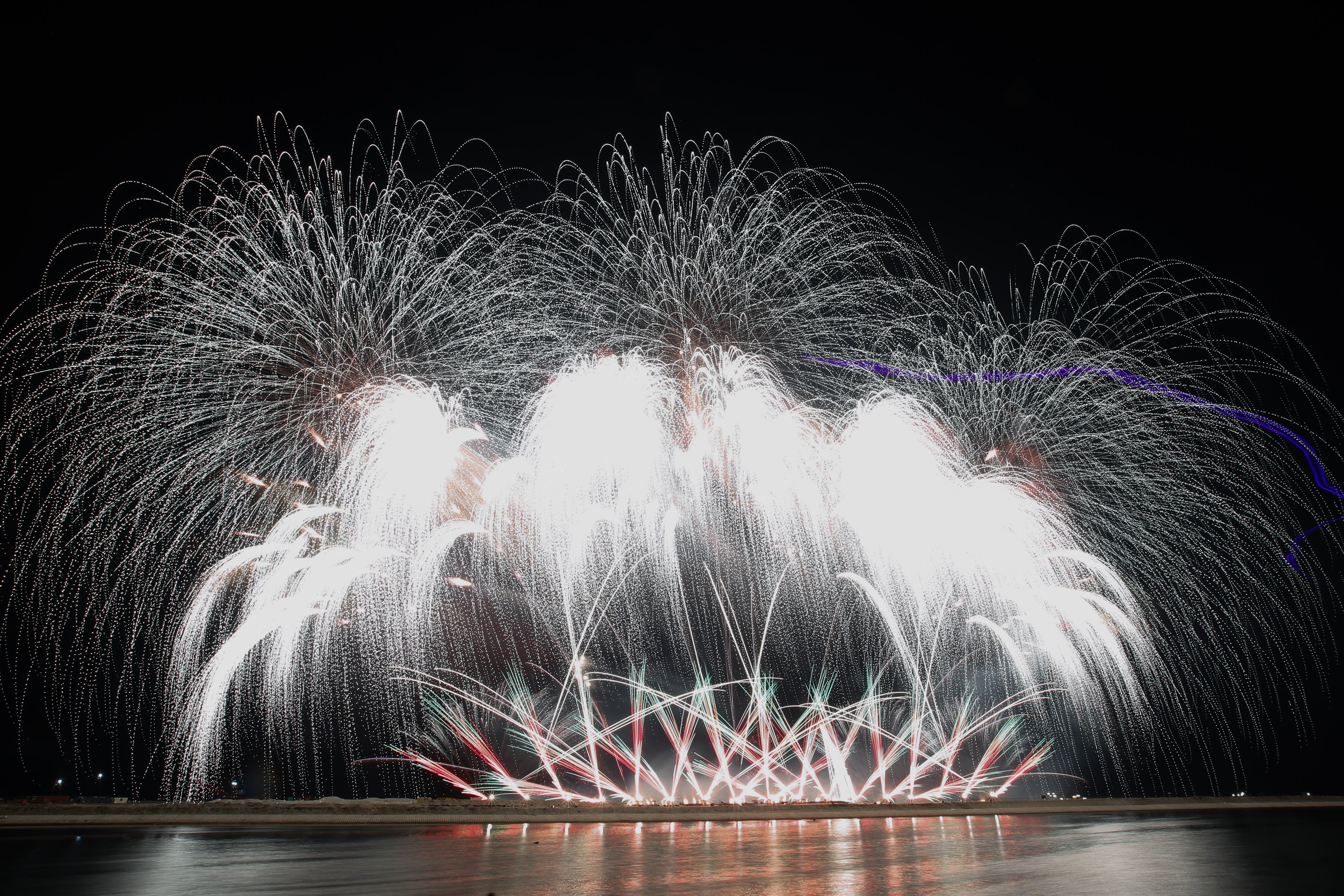 Philippines' Platinum Fireworks Incorporated lights up the Manila Bay skies during the finale exhibition of the 13th Philippine International Pyromusical Competition at the SM Mall of Asia in Pasay City on 11 April 2026. Pyrotex Fireworx from the United Kingdom took this year's championship title, besting seven other competing countries.