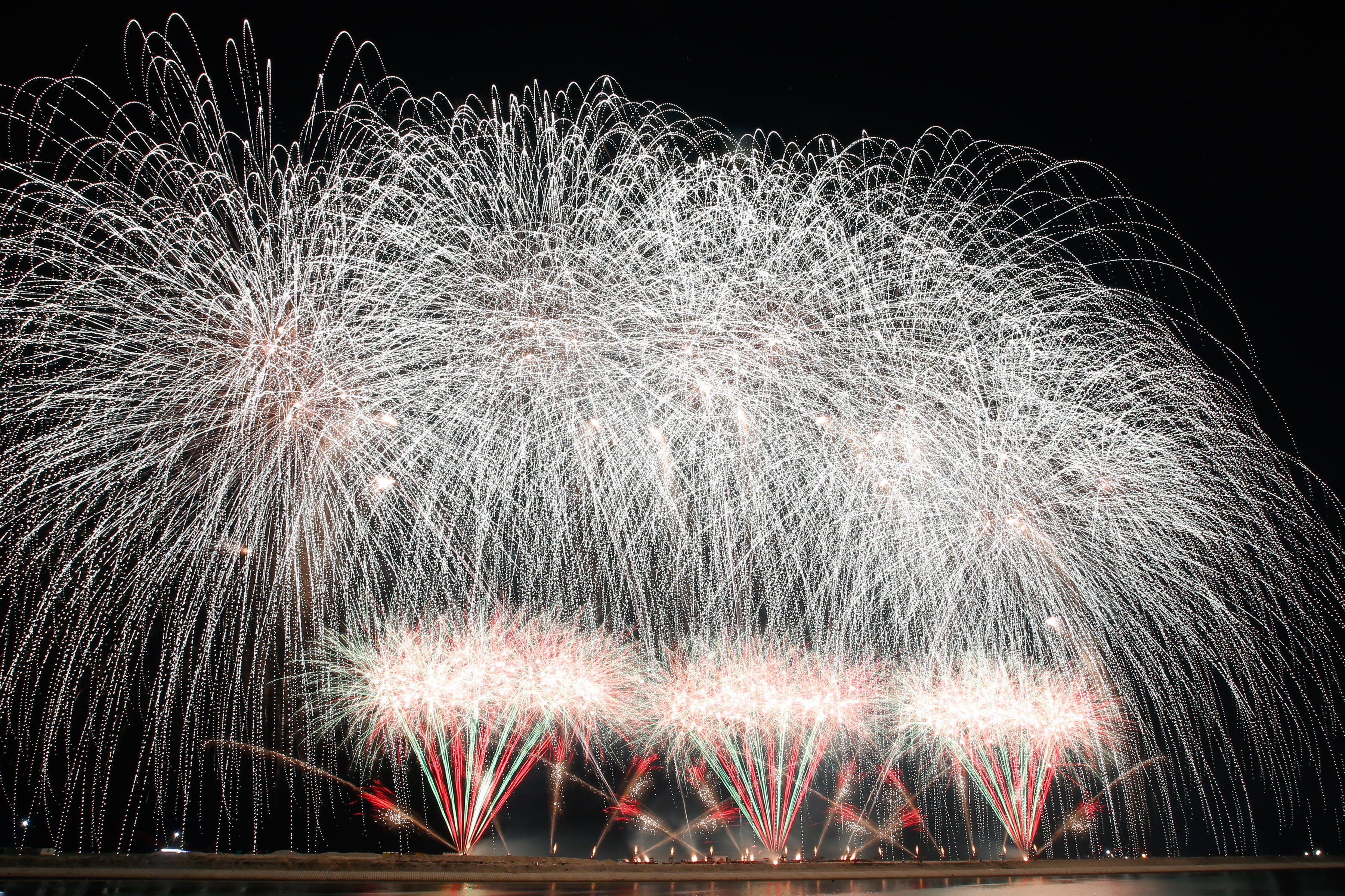 Philippines' Platinum Fireworks Incorporated lights up the Manila Bay skies during the finale exhibition of the 13th Philippine International Pyromusical Competition at the SM Mall of Asia in Pasay City on 11 April 2026. Pyrotex Fireworx from the United Kingdom took this year's championship title, besting seven other competing countries.