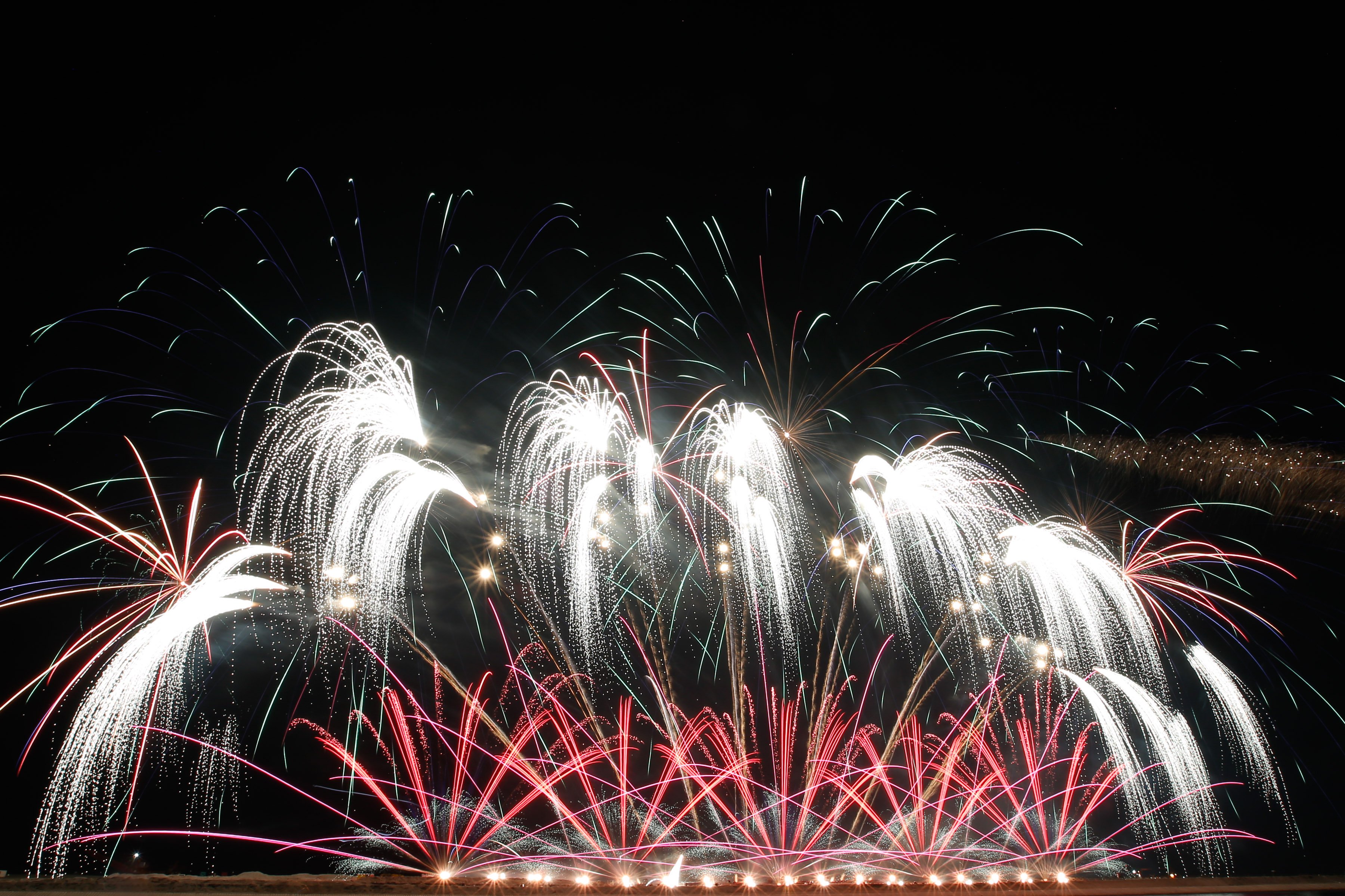 Philippines' Platinum Fireworks Incorporated lights up the Manila Bay skies during the finale exhibition of the 13th Philippine International Pyromusical Competition at the SM Mall of Asia in Pasay City on 11 April 2026. Pyrotex Fireworx from the United Kingdom took this year's championship title, besting seven other competing countries.