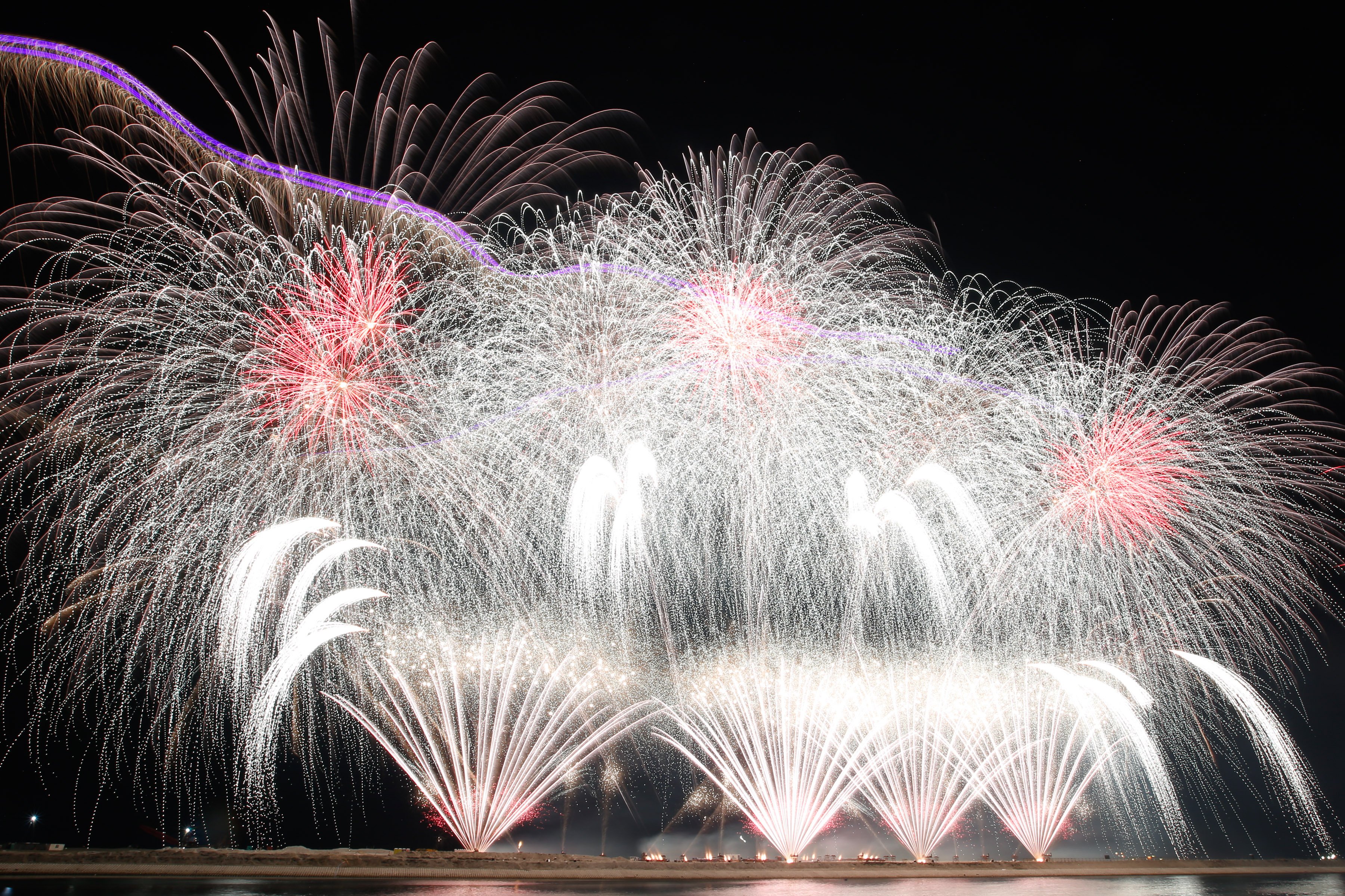 Philippines' Platinum Fireworks Incorporated lights up the Manila Bay skies during the finale exhibition of the 13th Philippine International Pyromusical Competition at the SM Mall of Asia in Pasay City on 11 April 2026. Pyrotex Fireworx from the United Kingdom took this year's championship title, besting seven other competing countries.