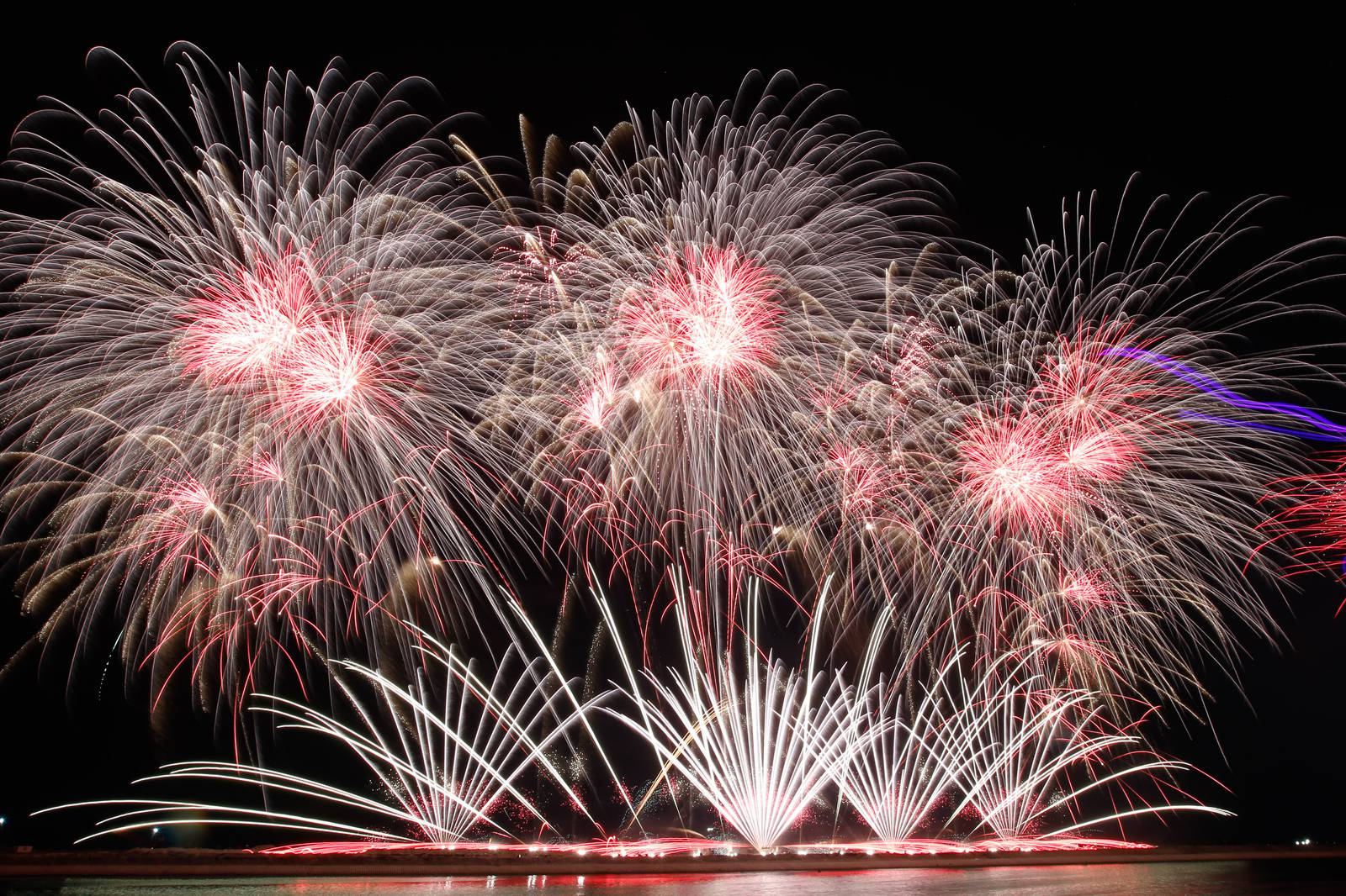 Philippines' Platinum Fireworks Incorporated lights up the Manila Bay skies during the finale exhibition of the 13th Philippine International Pyromusical Competition at the SM Mall of Asia in Pasay City on 11 April 2026. Pyrotex Fireworx from the United Kingdom took this year's championship title, besting seven other competing countries.