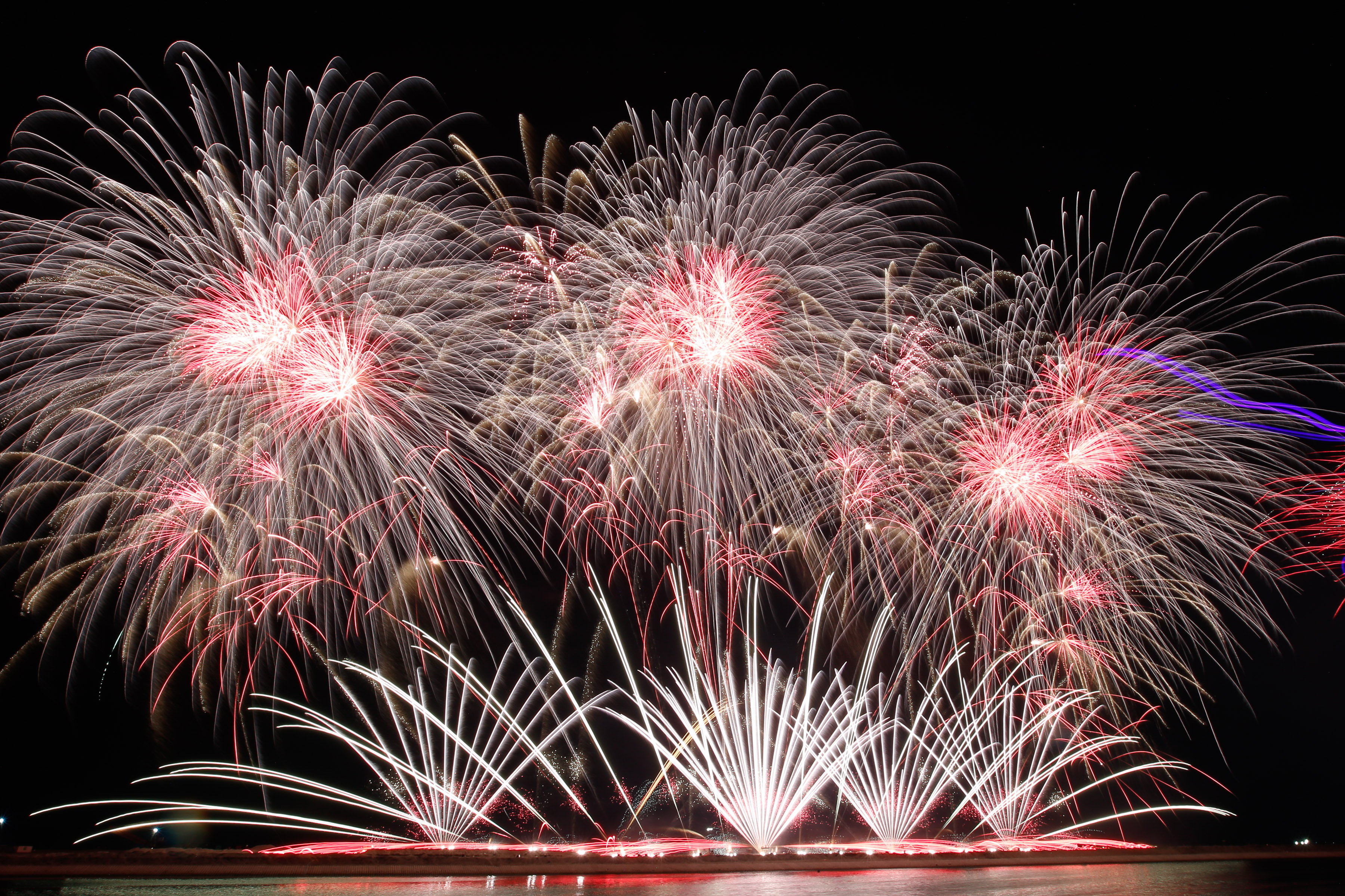 Philippines' Platinum Fireworks Incorporated lights up the Manila Bay skies during the finale exhibition of the 13th Philippine International Pyromusical Competition at the SM Mall of Asia in Pasay City on 11 April 2026. Pyrotex Fireworx from the United Kingdom took this year's championship title, besting seven other competing countries.
