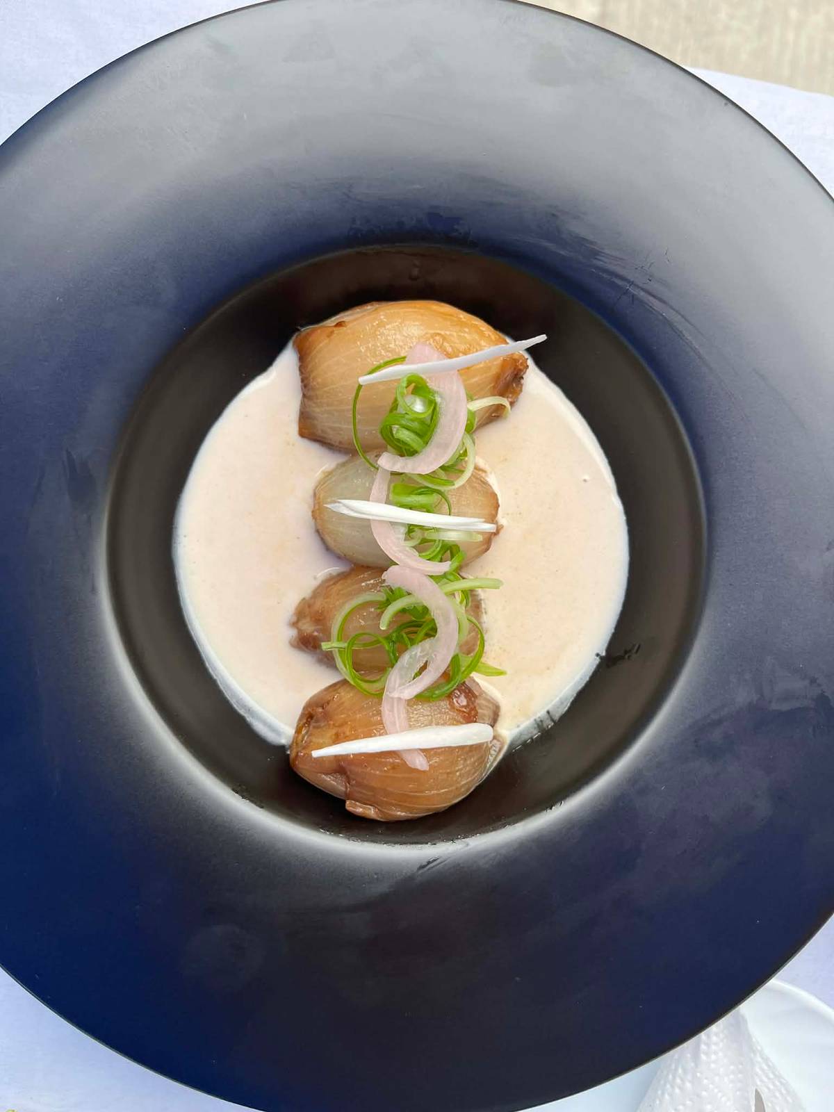 BRAISED stuffed onion with coconut chili sauce by Phillip Alo (first place, dish category).