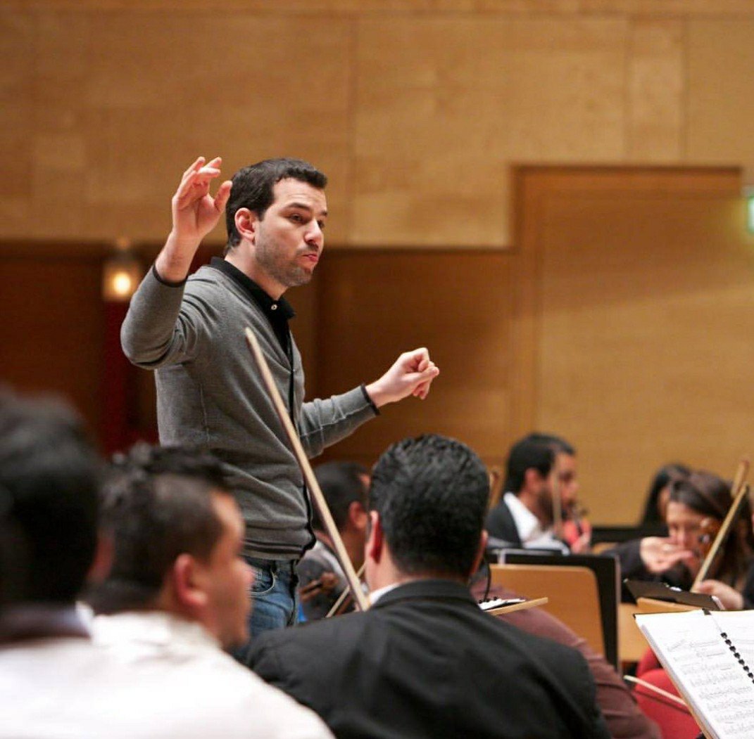 Venezuelan guest conductor Joshua Dos Santos.