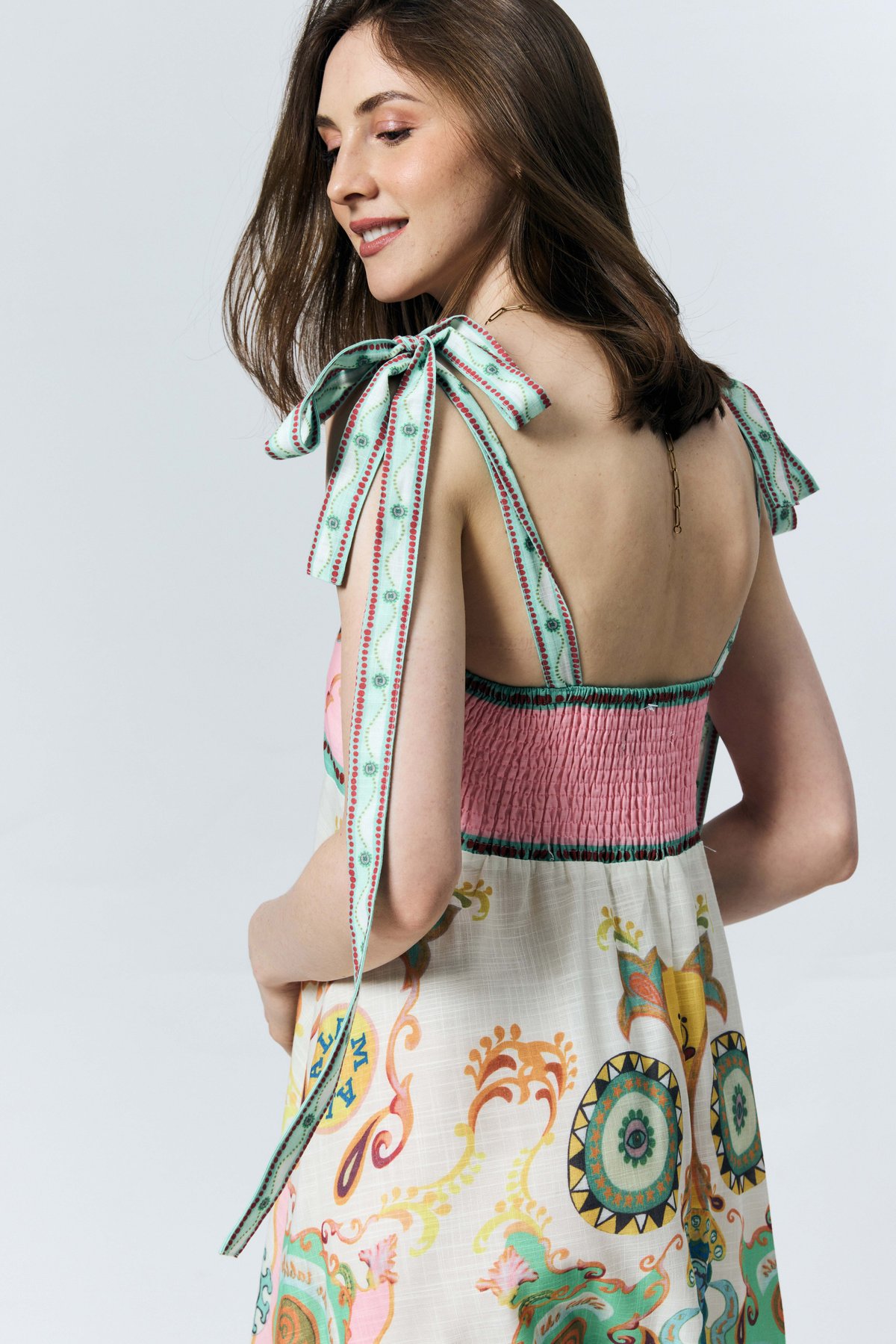 Maximalism meets mysticism in a sweeping, oversized paisley print motifs. The iconic _Persian pickles_ intertwine with the intricate geometry of mandala-inspired ornaments for a storied sophisticated look
