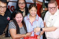 MAKATI Mayor Nancy Binay (second from right), Agriculture Secretary Francisco Tiu Laurel Jr. (right) and other officials launch the ‘Benteng Bigas, Meron Na!’ program at Makati City Hall on Tuesday which aims to help local families manage rising costs.