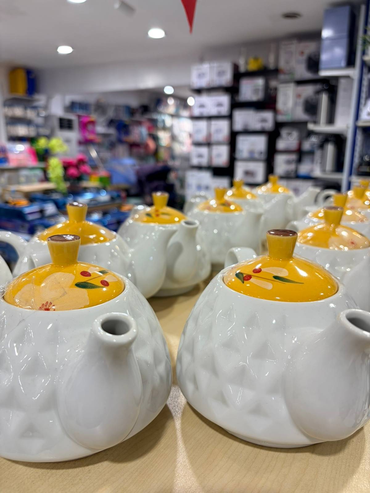 YELLOW pots bring warmth and cheer to any space.