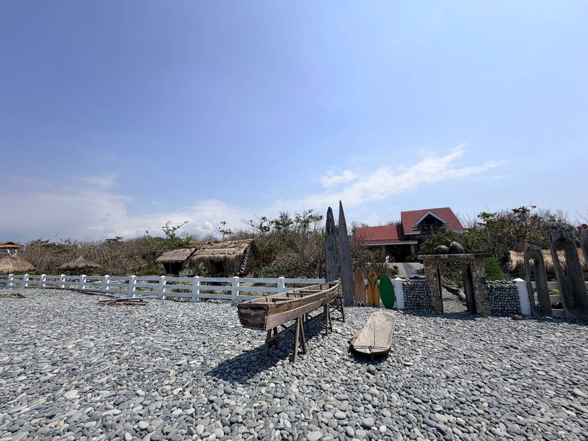 PEBBLESrest along the shore, carefully left untouched to preserve the land and protect its natural balance.