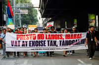 Members of transport group PISTON and other progressive organizations march to a gas station along Taft Avenue in Manila on Wednesday, April 15, 2026, as part of a nationwide transport strike protesting rising fuel prices and the government’s response to the oil crisis.
Jeepney drivers later stomp on images of Ferdinand Marcos Jr., Donald Trump and Benjamin Netanyahu to conclude the rally.