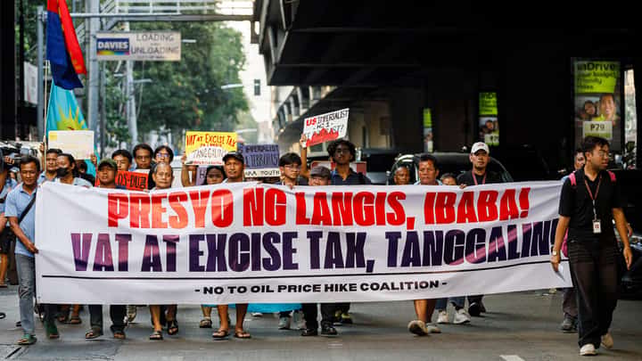 Members of transport group PISTON and other progressive organizations march to a gas station along Taft Avenue in Manila on Wednesday, April 15, 2026, as part of a nationwide transport strike protesting rising fuel prices and the government’s response to the oil crisis.
Jeepney drivers later stomp on images of Ferdinand Marcos Jr., Donald Trump and Benjamin Netanyahu to conclude the rally.