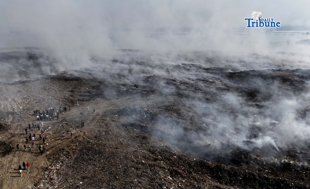 LANDFILL BLAZE FROM ABOVE: An aerial view of the Navotas Sanitary Landfill on 16 April 2026 shows a fire that has been burning for days, affecting nearby communities in Navotas, Malabon, and Obando, Bulacan. Photo by Analy Labor.