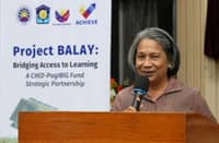 PAG-IBIG Fund chief executive officer Marilene Acosta speaks during the launch of the ‘Project BALAY: Bridging Access to Learning’ program at the Commission on Higher Education auditorium.
