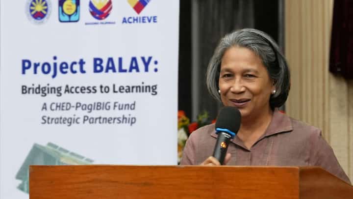 PAG-IBIG Fund chief executive officer Marilene Acosta speaks during the launch of the ‘Project BALAY: Bridging Access to Learning’ program at the Commission on Higher Education auditorium.