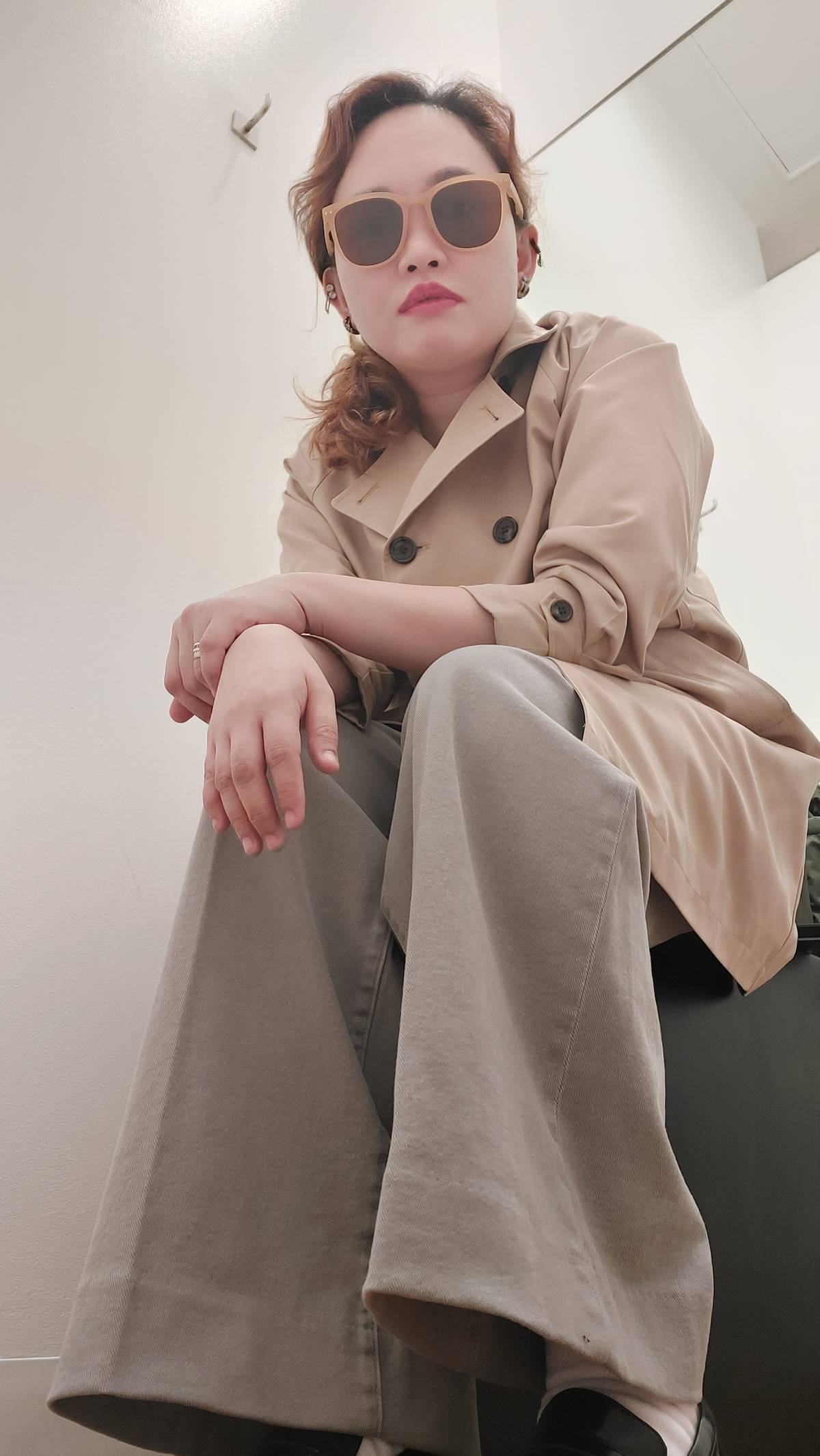 THIS water-repellent Uniqlo trench coat can also be worn on its own as a dress.