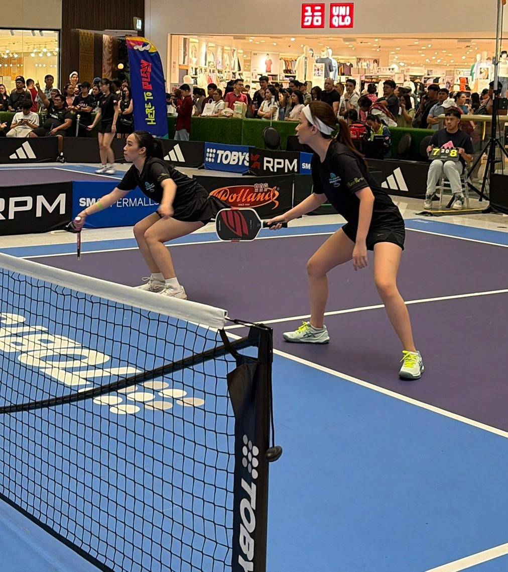 WOMEN'S division heats up the court with fast rallies and fierce precision at SM North EDSA.