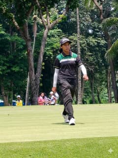 BRITTANY Tamayo walks off the ninth green after shooting a 73 in the JGFP World Team Championships in Davao City.