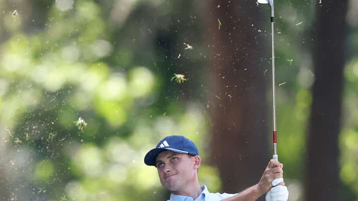 LUDVIG Åberg of Sweden hits from a bunker on the 16th hole during the opening round of the RBC Heritage at Harbour Town Golf Links in Hilton Head Island, South Carolina.
