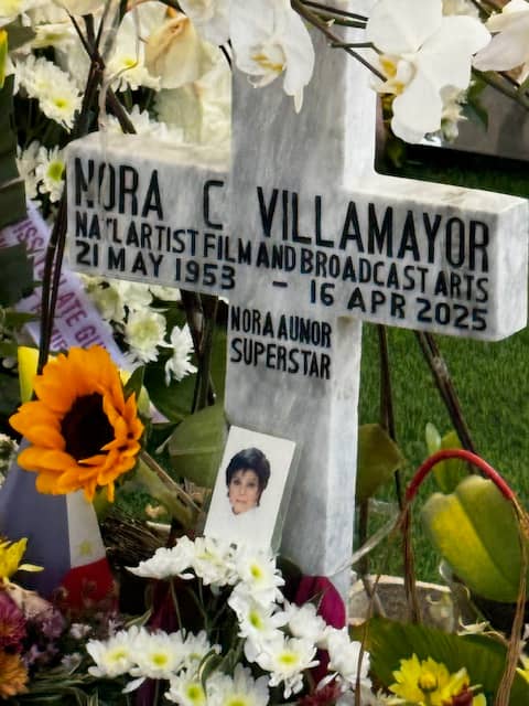 A view of the flower-adorned tomb of National Artist for Film Nora Aunor.