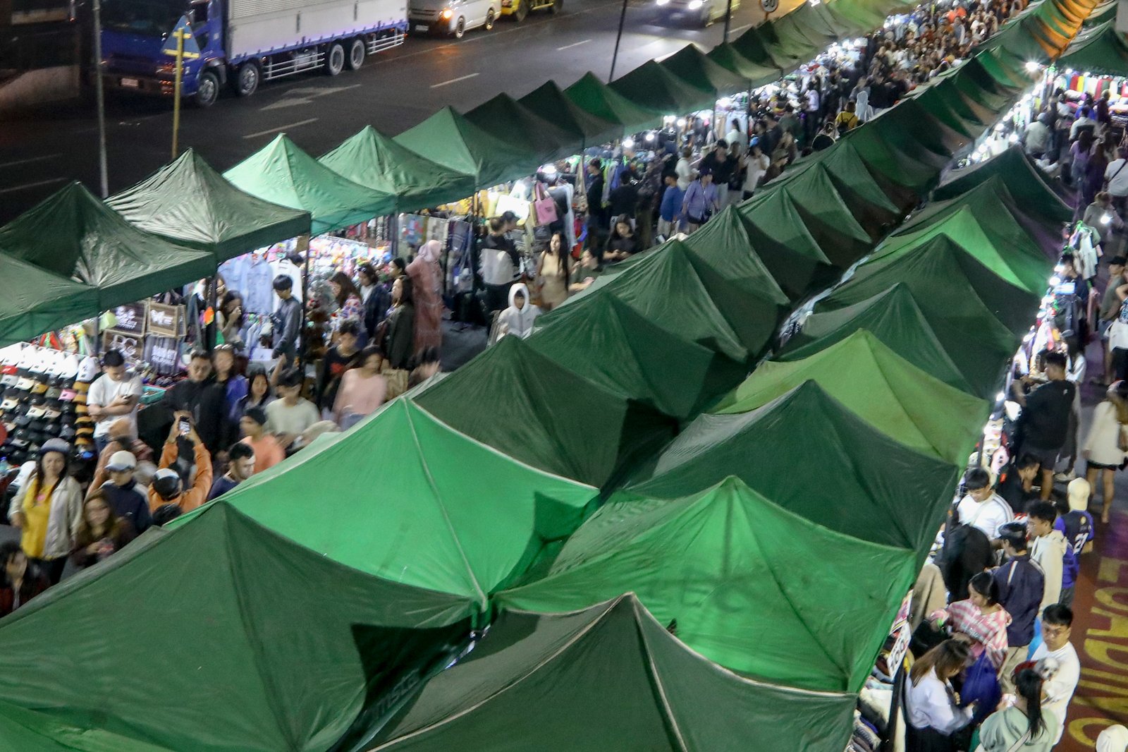 Various tents selling souvenirs, thrifted goods, and food are seen standing along Harrison Road, Baguio City on Friday, 18 April, 2026.| Aram Lascano