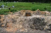 AN open grave at the cemetery of Cumuto, Trinidad and Tobago, taken on 18 April 2026.