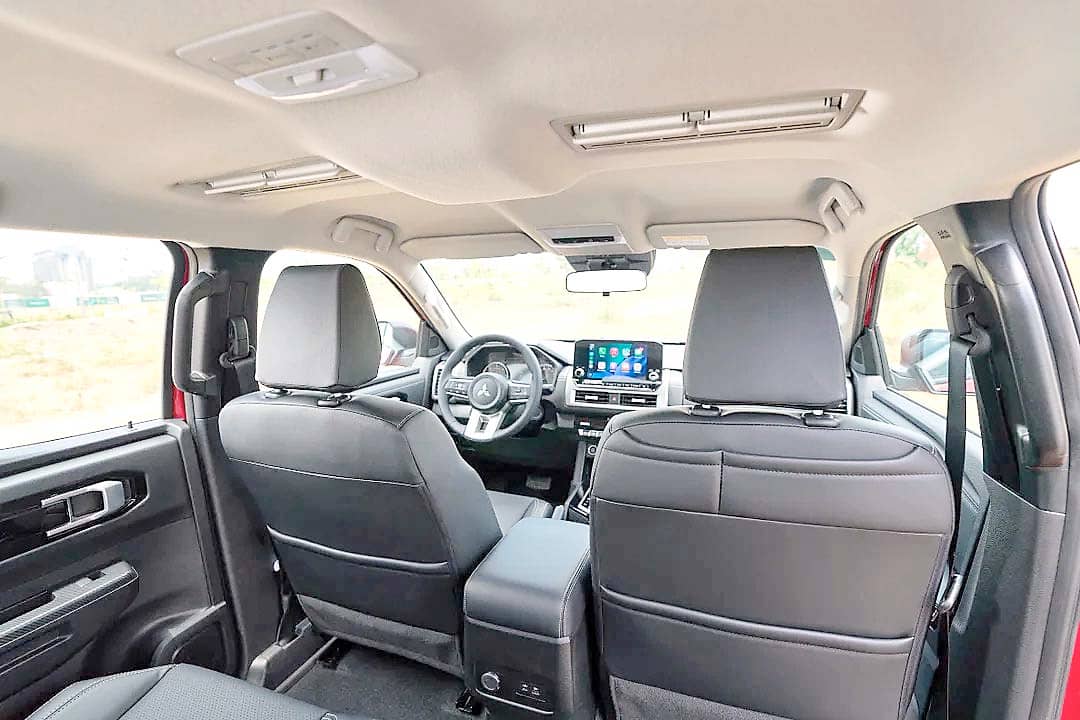 CABIN now uses black leather seats in the GLS variant, replacing fabric and giving the Triton a more refined interior feel.