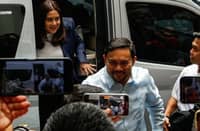 SENATORS Mark and Camille Villar arrive at the Department of Justice on Monday for the continuation of the SEC-linked investigation.