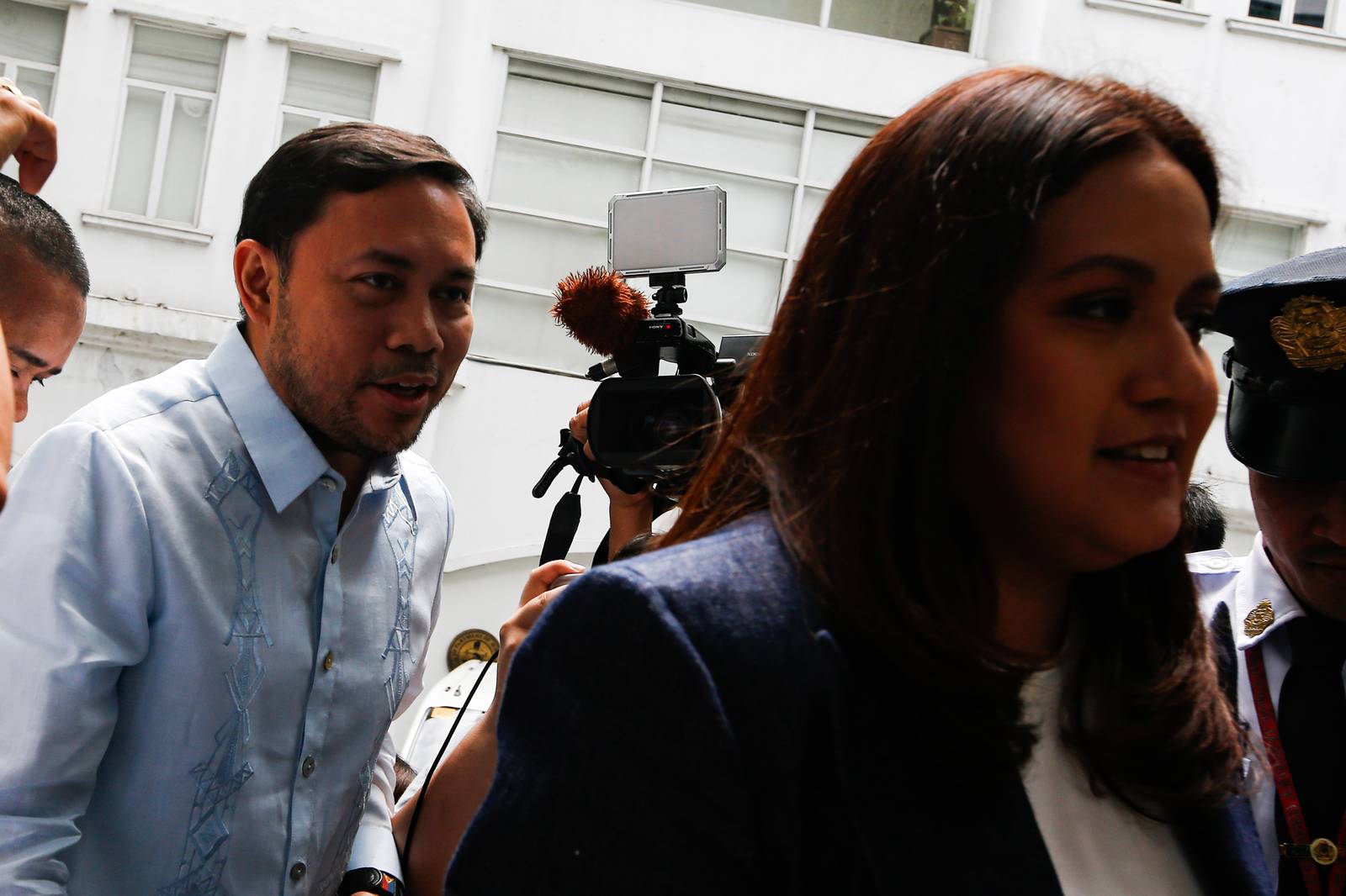 Senators Mark Villar and Camille Villar arrive at the Department of Justice in Ermita, Manila, on 20 April 2026 for the continuation of the preliminary investigation into the market manipulation, insider trading, and misleading disclosure complaints filed by the Securities and Exchange Commission against Villar Land Holdings Corporation officers.