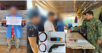 Former CTG leader surrenders arms in Bataan