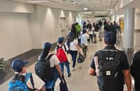 TWENTY-FIVE overseas Filipino workers arrive at Ninoy Aquino International Airport Terminal 3 in Pasay City. The group, consisting of 14 caregivers from Israel and 11 household service workers from Lebanon, was repatriated by the Department of Migrant Workers and the Department of Foreign Affairs due to the ongoing conflict in the Middle East.