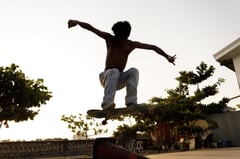 Teen skaters perfrom tricks at Parañaque Skate Park