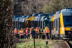 Commuter trains collide, 17 injured