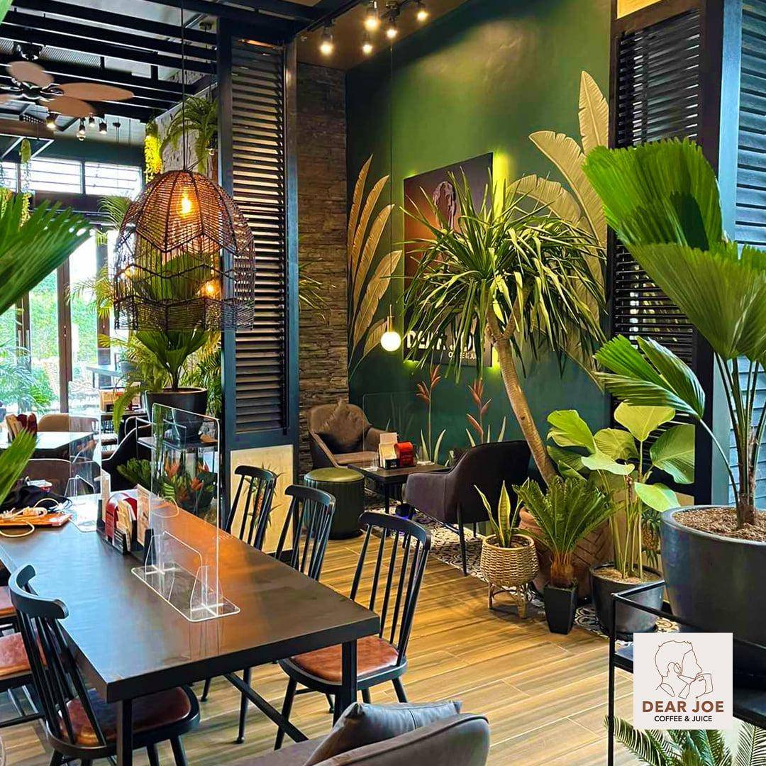 WARM lighting, wooden interiors, and shelves of books create a cozy and nostalgic atmosphere inside Dear Joe.