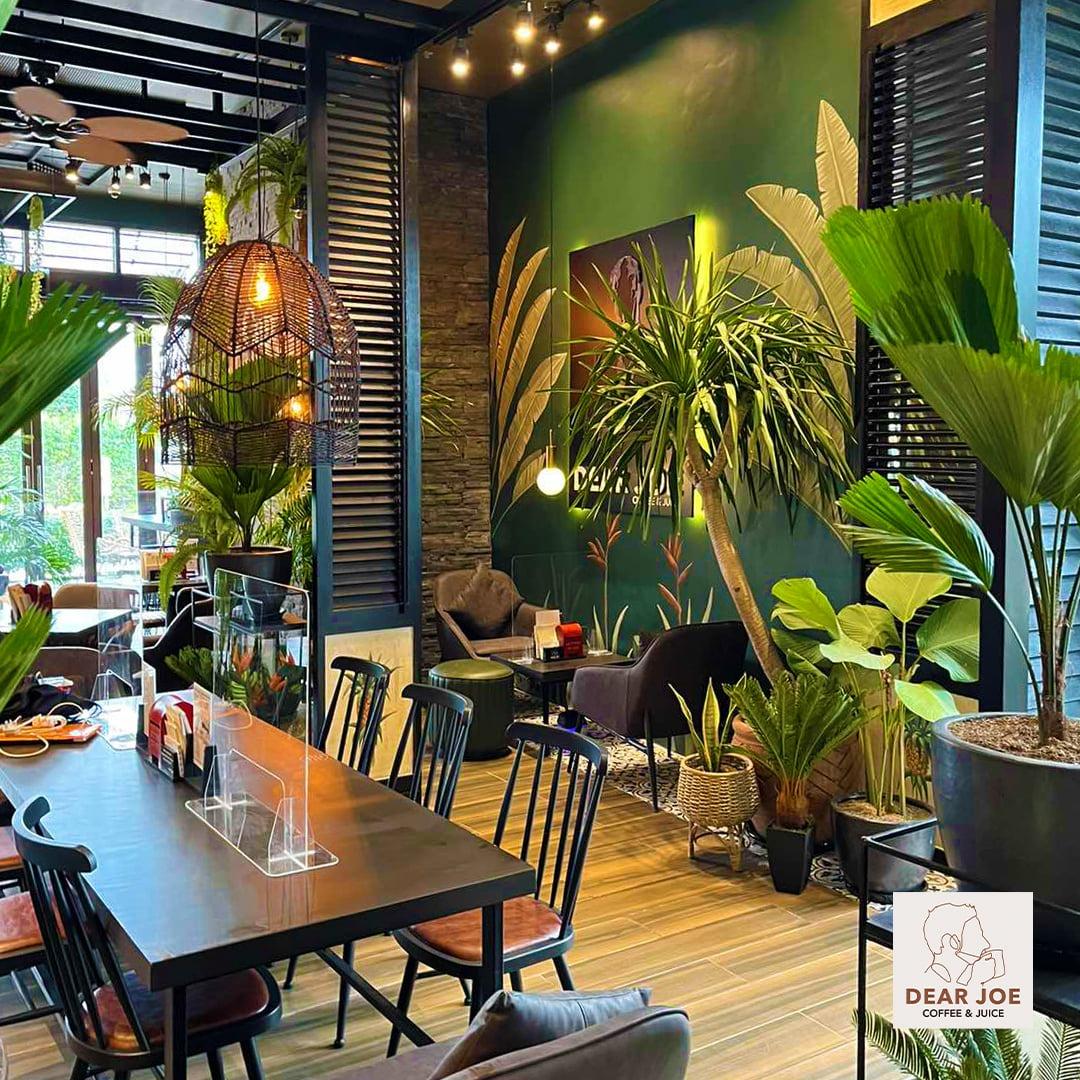 WARM lighting, wooden interiors, and shelves of books create a cozy and nostalgic atmosphere inside Dear Joe.