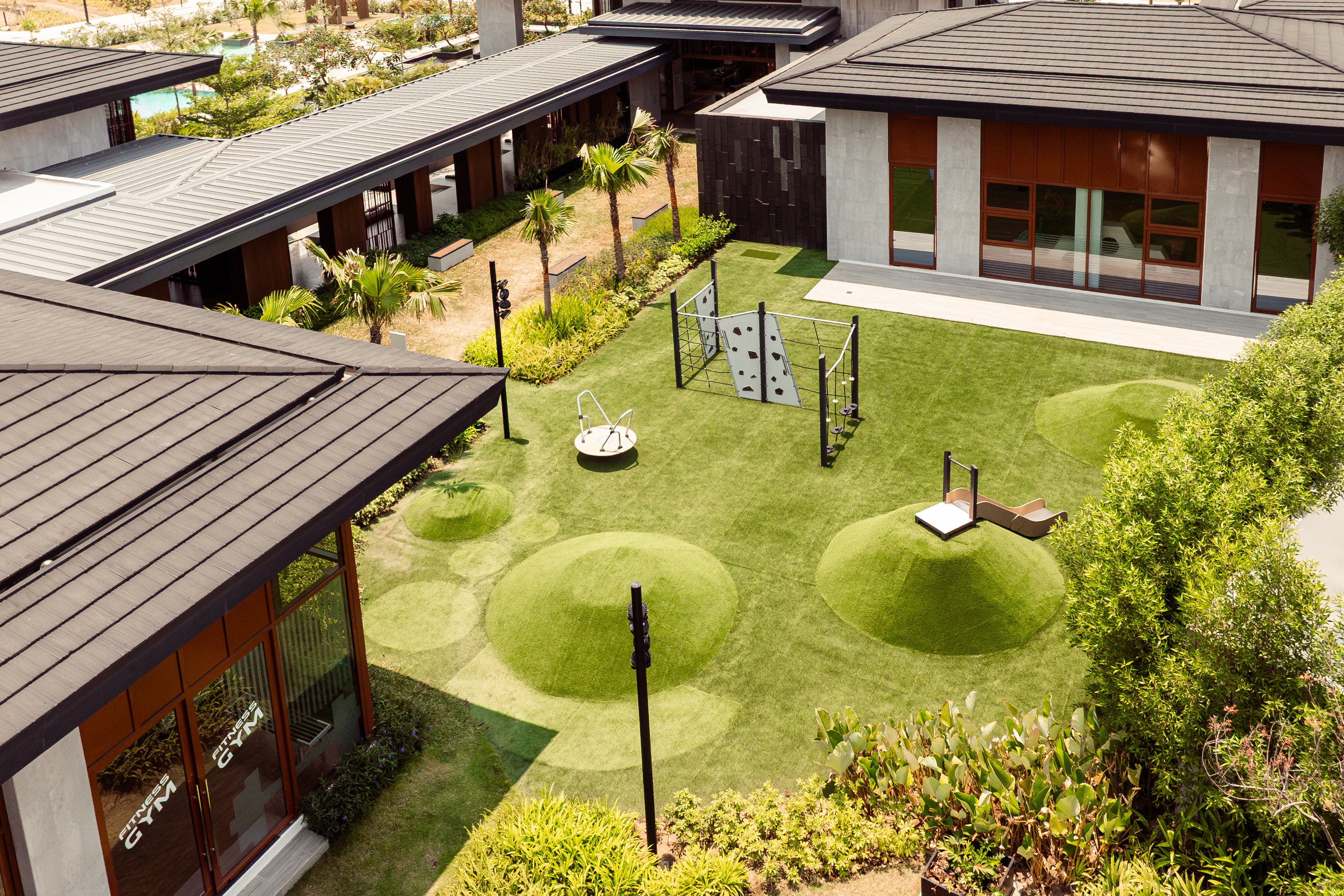 GUESTS arrive by walking across floating steps that glide through lush greenery.