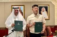 MUSLIM Filipinos commissioner Sabuddin Abdurahim (right) and Saudi ambassador Faisal Ebraheem Alghamdi sign documents marking the Philippines’ formal acceptance of this year’s 25-ton shipment of dates from the Kingdom of Saudi Arabia.