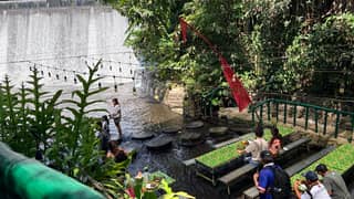 DINING where water flows beneath.