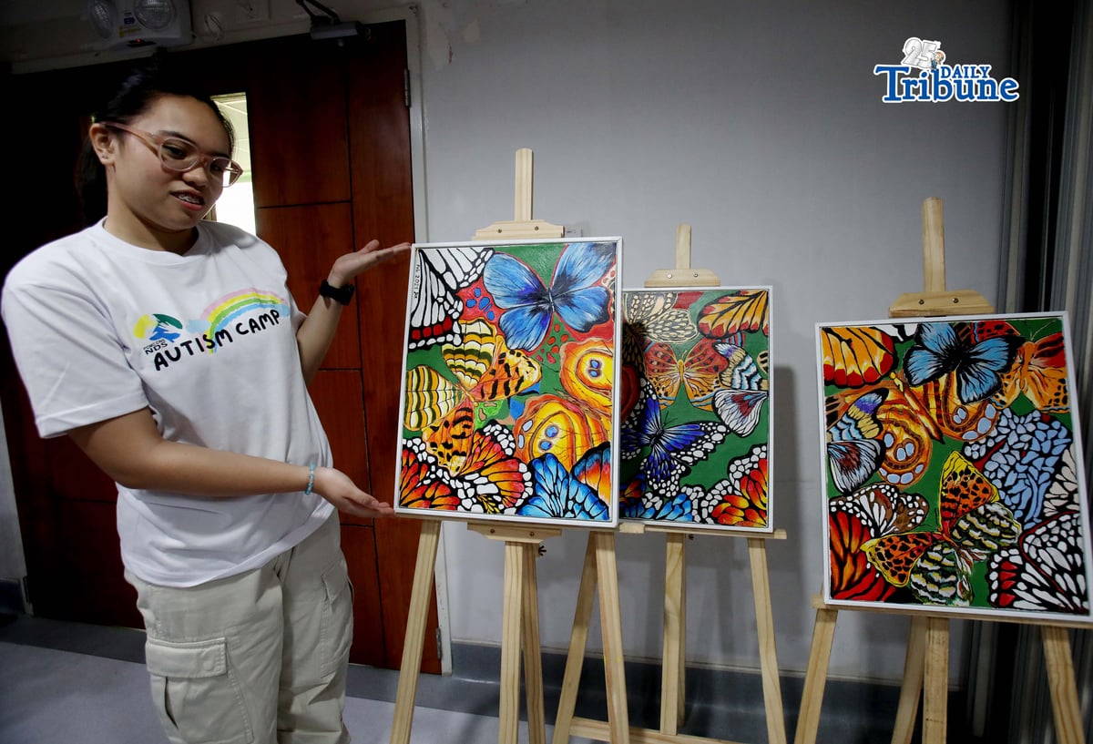 (April 25 2026) Juliana Elijah Erlano 18 years old show her art work with Philippine Children’s Medical Center (PCMC) Neurodevelopmental Pediatrics head Dr. Ermenilda Avendaño,  during the Philippine Children’s Medical Center 3rd Autism Camp launching, a series of lectures and workshops for parents, a community effort that brings together families, health professionals, and advocates in one setting. And also to support, Inspire, Nurture: Autism Empowering Guardians, held at PCMC hospital in Quezon City on Saturday April 25 2026. Photo/Analy Labo