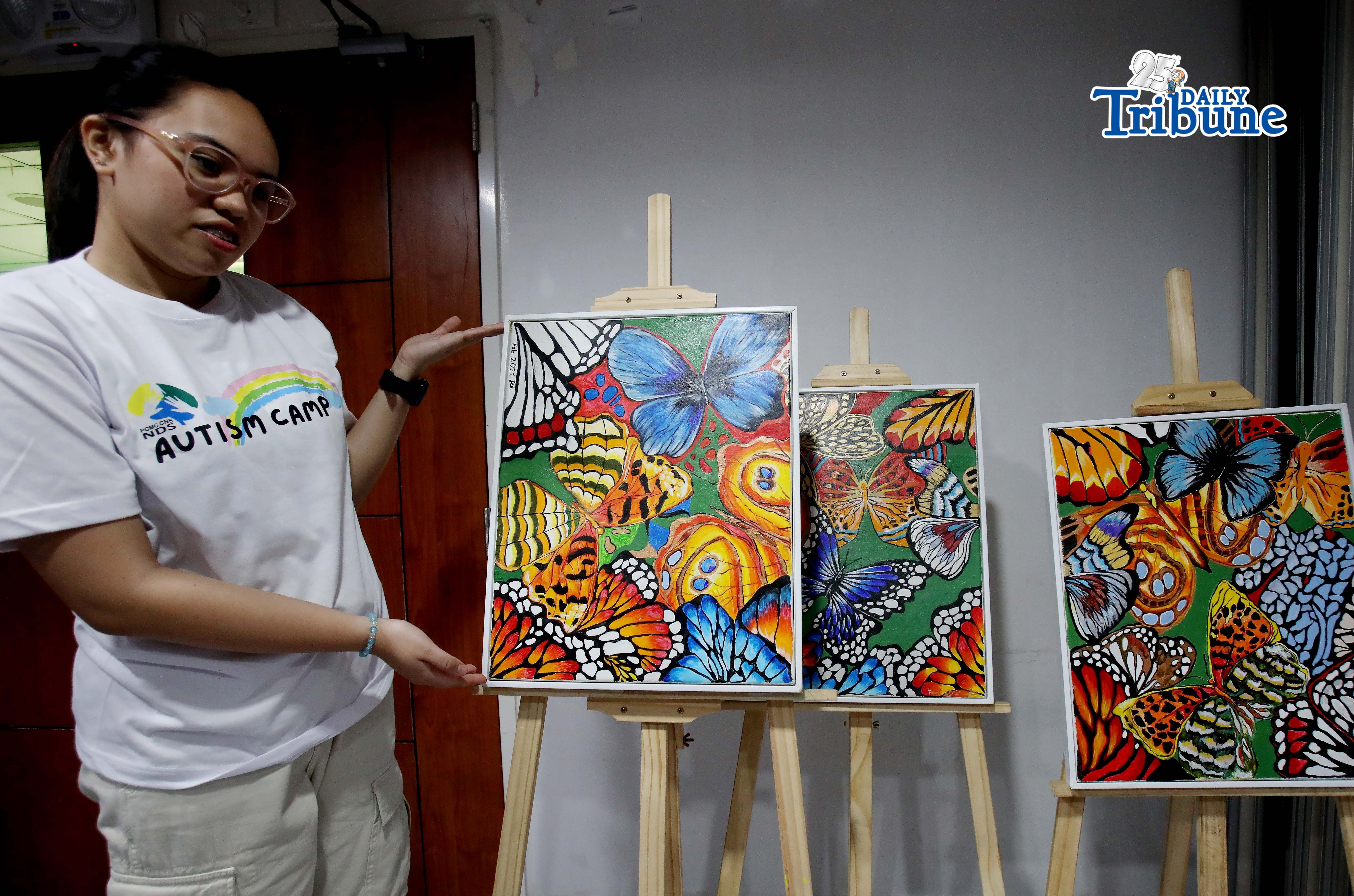 (April 25 2026) Juliana Elijah Erlano 18 years old show her art work with Philippine Children’s Medical Center (PCMC) Neurodevelopmental Pediatrics head Dr. Ermenilda Avendaño,  during the Philippine Children’s Medical Center 3rd Autism Camp launching, a series of lectures and workshops for parents, a community effort that brings together families, health professionals, and advocates in one setting. And also to support, Inspire, Nurture: Autism Empowering Guardians, held at PCMC hospital in Quezon City on Saturday April 25 2026. Photo/Analy Labo