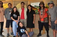 MEMBERS of the Rahmag Art Group with Celentino Dalumpines of the Antique Provincial Tourism Office during the exhibit opening.