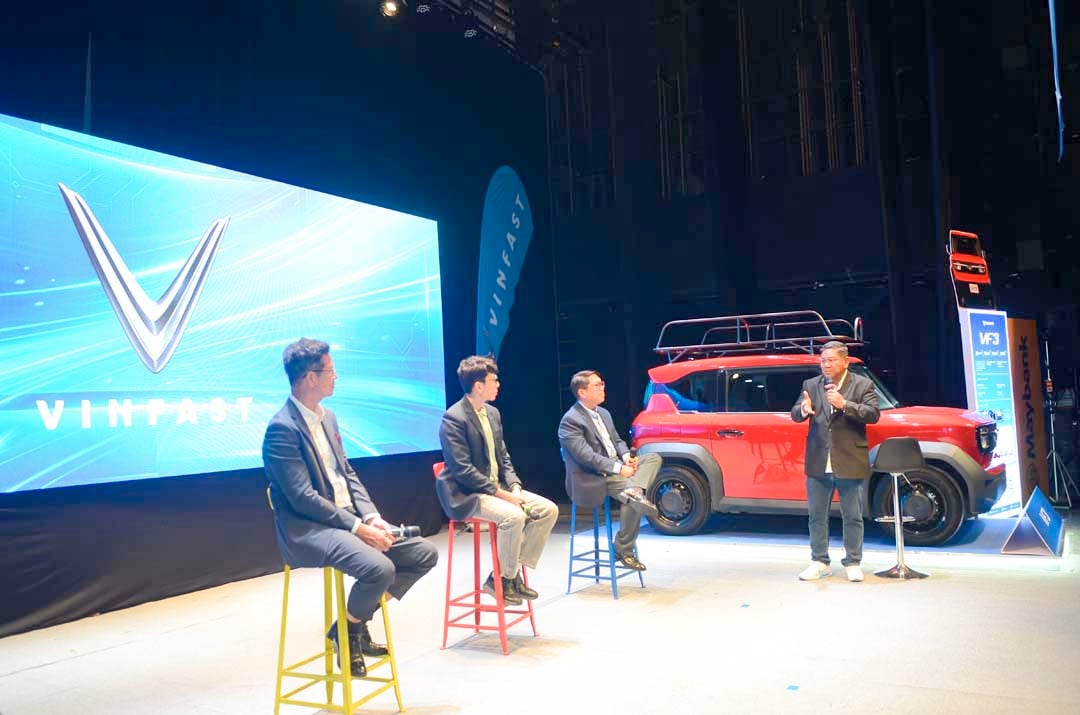 EV symposium tackles transport costs