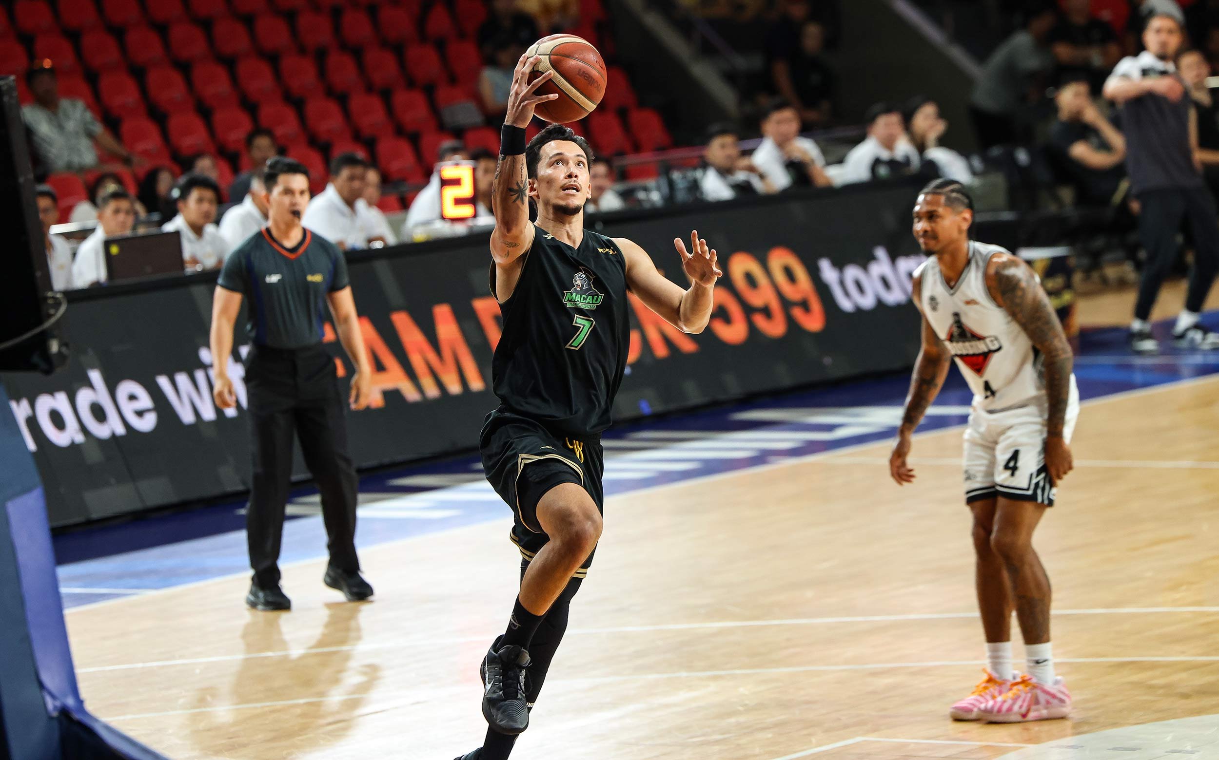 Macau keeps playoff hopes alive
