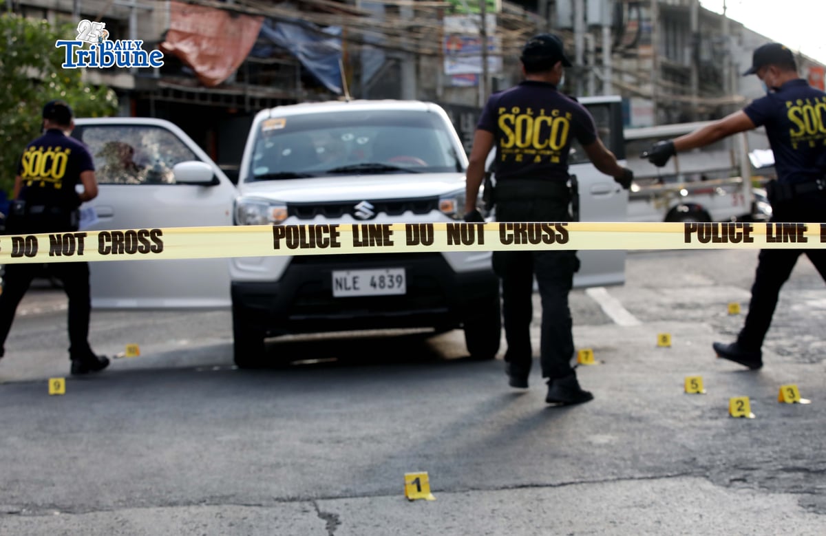 (April 28 2026) Scene of the Crime Operative SOCO gather evidence following an alleged ambush of two unidentified persons injured by a tandem at the corner of Timog Avenue and EDSA in Quezon City on Tuesday, April 28, 2026. Photo/Analy Labor