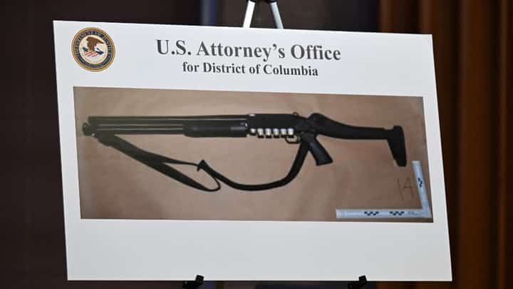 A firearm was displayed during a news conference at the Department of Justice headquarters on 27 April 2026, as authorities detailed charges against the man accused of the shooting at a media gala attended by President Donald Trump.