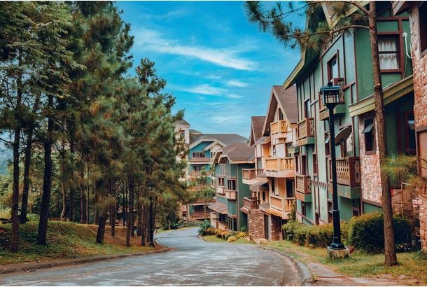 CROSSWINDS Tagaytay offers a Swiss-inspired mountain retreat surrounded by pine trees and cool natural landscapes.