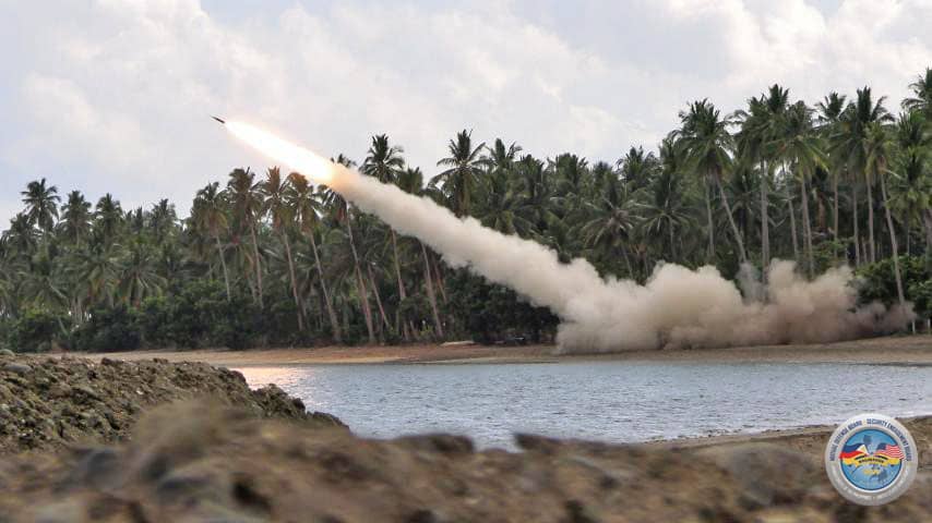 CLLFX_Photo 8: A rocket launch from the U.S. High Mobility Artillery Rocket Systems (HIMARS) illuminates the shoreline during the Counter-Landing Live Fire Exercise at Apurawan Beach, Palawan on April 27, 2026. (Photo by Staff Sgt. Brandon Rickert, 7th Infantry Division, US Army)