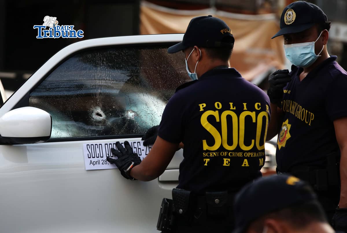 (April 28 2026) Scene of the Crime Operative SOCO gather evidence following an alleged ambush of two unidentified persons injured by a tandem at the corner of Timog Avenue and EDSA in Quezon City on Tuesday, April 28, 2026. Photo/Analy Labor