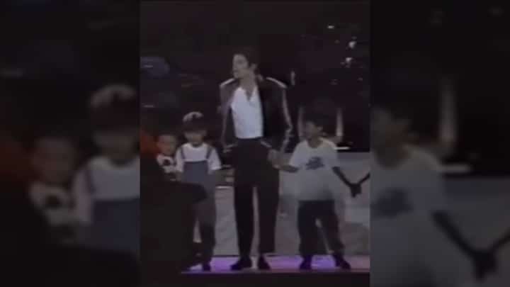 IC Mendoza (kid in white) with Michael Jackson on stage.